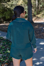 green scuba quarter zip pullover