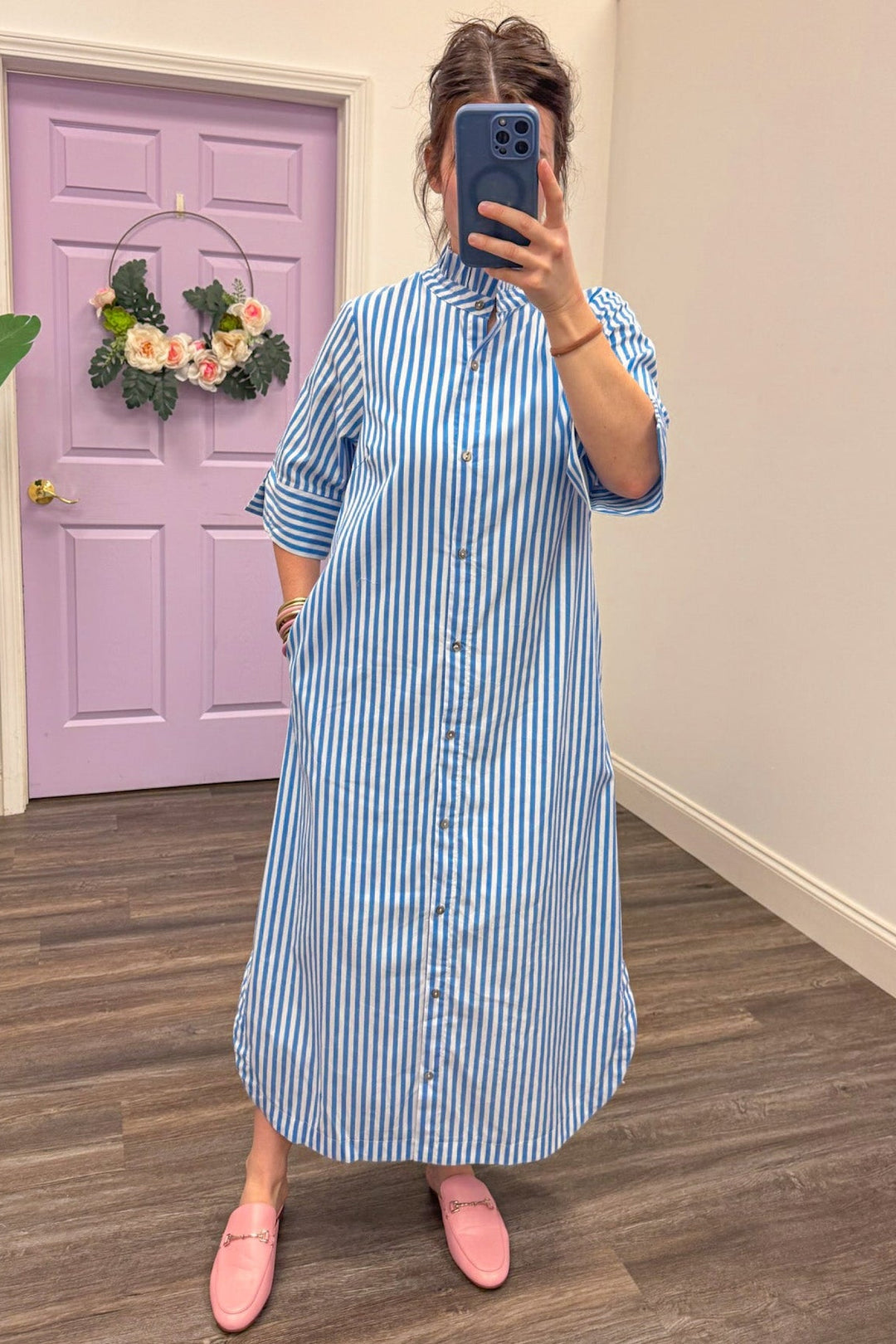 Women's blue and white striped midi dress with side pockets