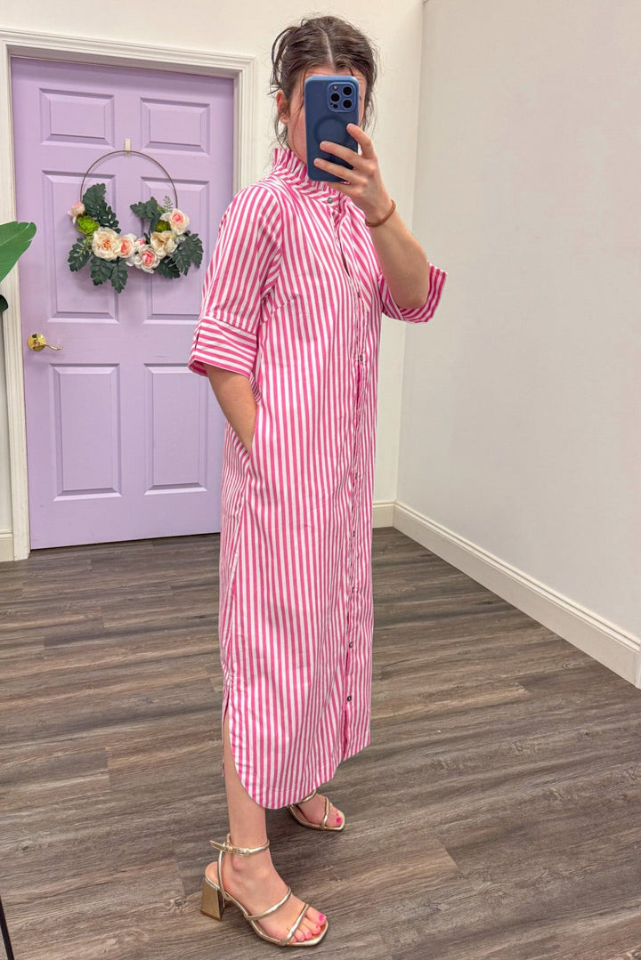 side view of Women's pink and white midi dress with pockets