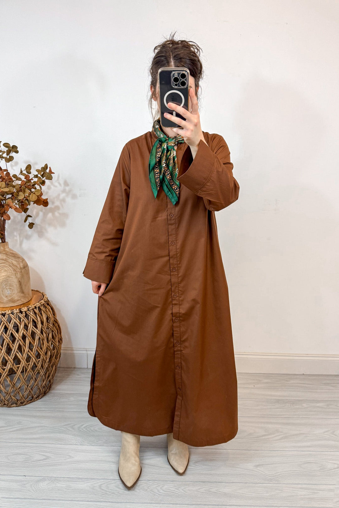 entro solid brown button up dress holding