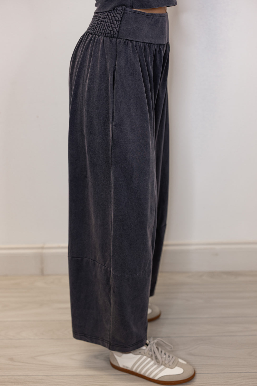 Women's ash black barrell pants and short sleeve top set by ee:some showing up close side view of pants