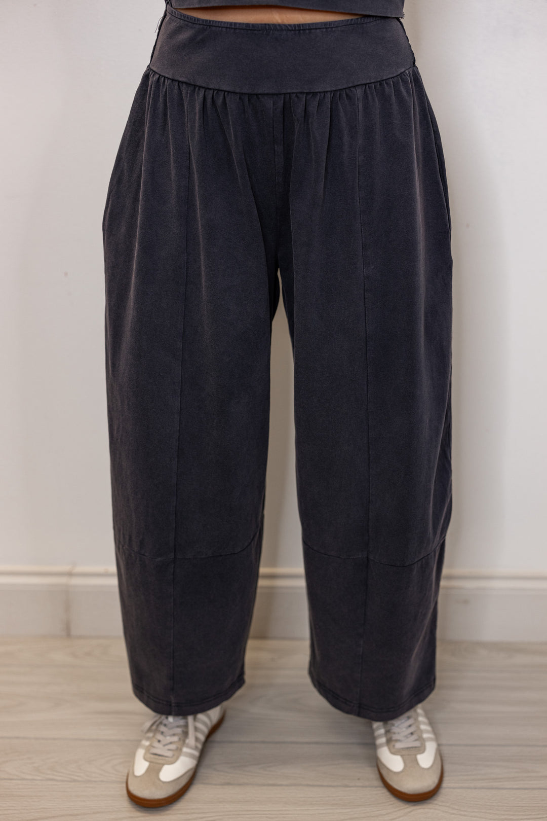 Women's ash black barrell pants and short sleeve top set by ee:some showing up close front view of pants
