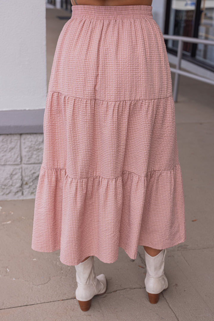 Women's mauve and mocha plaid print tiered midi skirt by Peach Love California showing up close back view