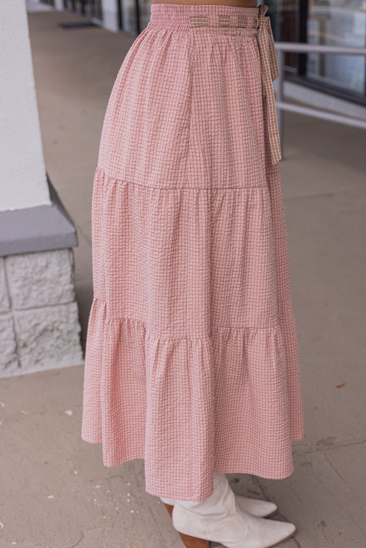 Women's mauve and mocha plaid print tiered midi skirt by Peach Love California showing up close side view