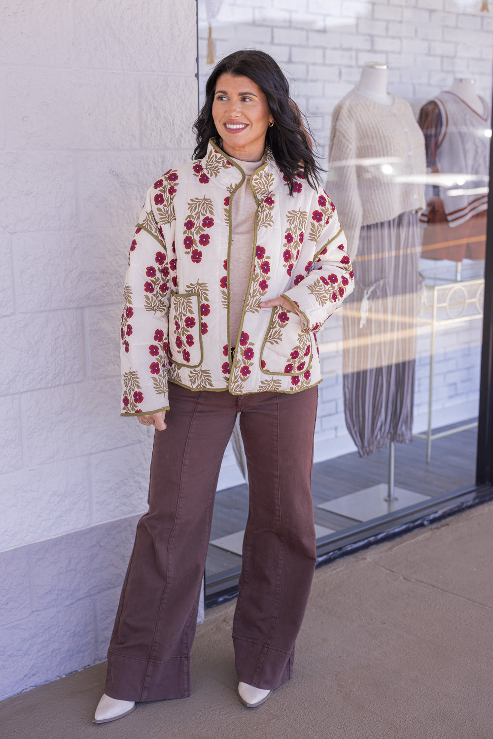 Women's ecru, dark red and olive floral print quilted puffer jacket by Entro, perfect for cooler weather