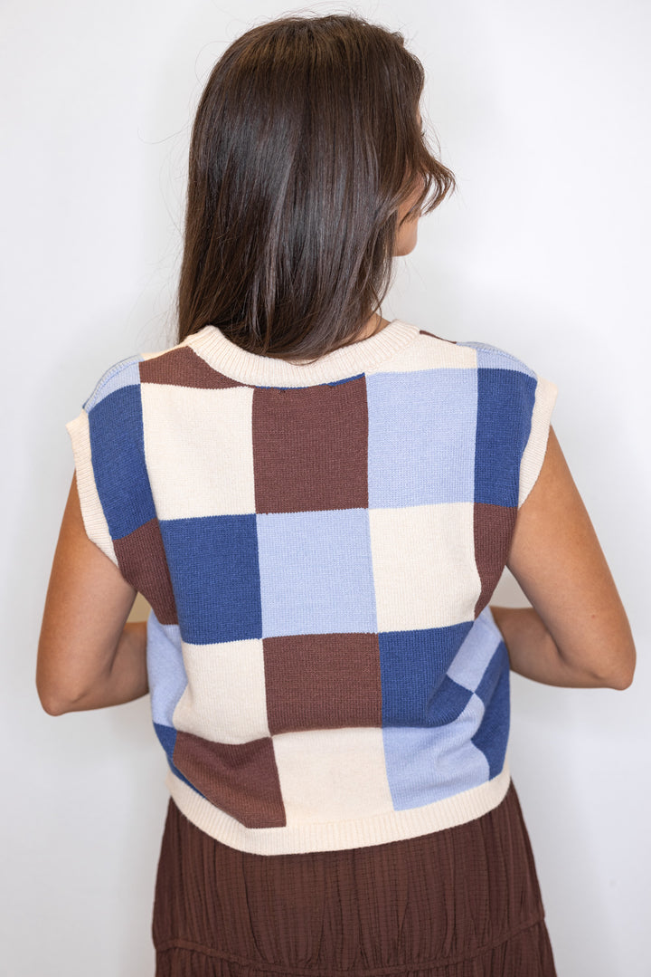 Women's blue, brown and cream checkered knit top with capped sleeves by ee:some showing up close back view