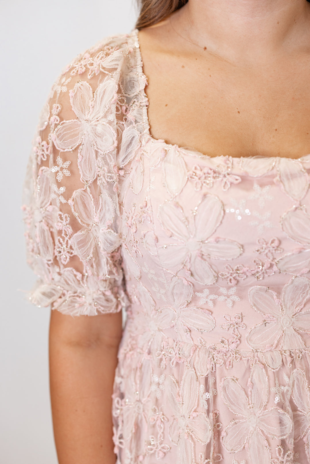 Women's dusty pink floral midi dress with sequins and gold metallic details by In February showing square neckline