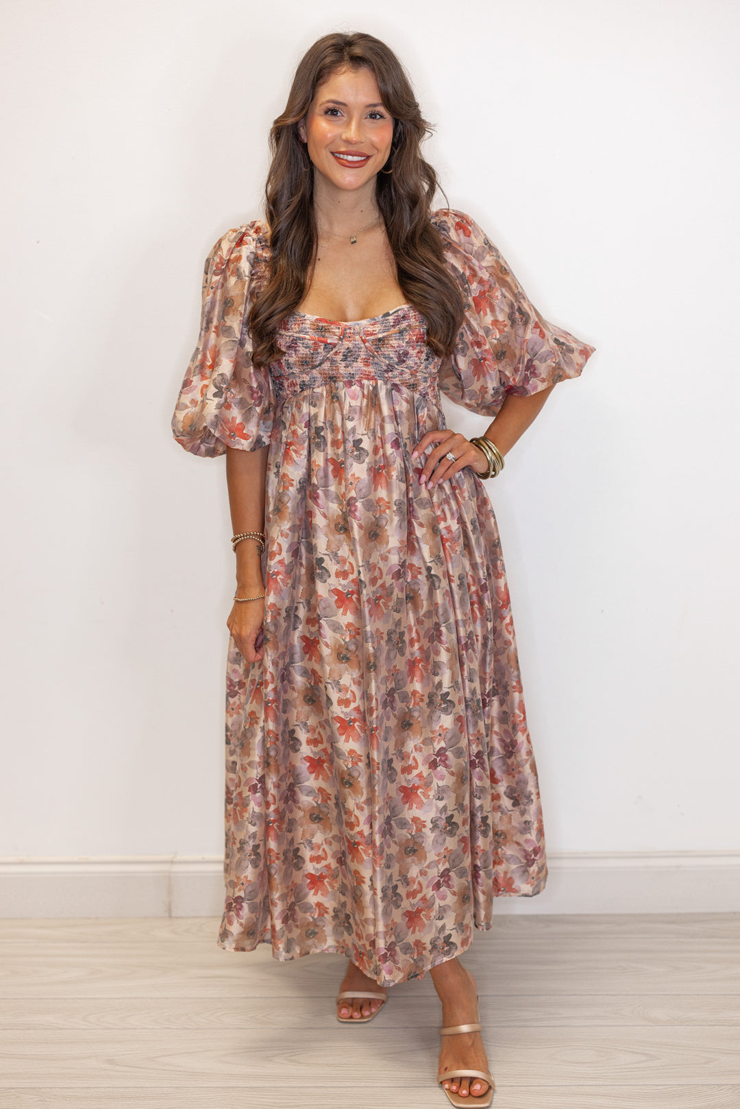Women's champagne and multicolor floral chiffon midi dress with smocked bodice by Sofie the Label showing full front view