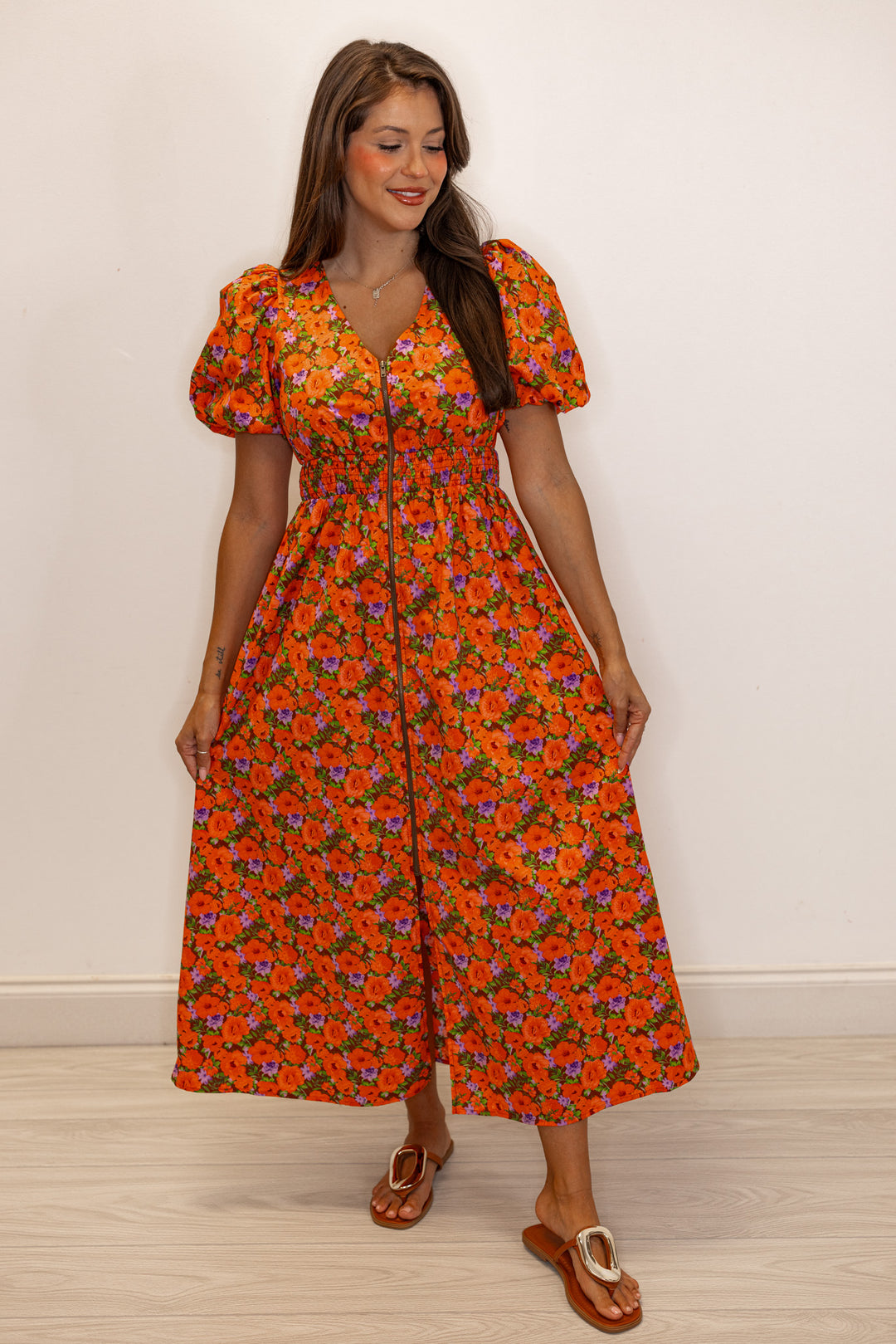 Women's zipper front midi dress with rust, brown and purple floral print by Fantastic Fawn showing full front view