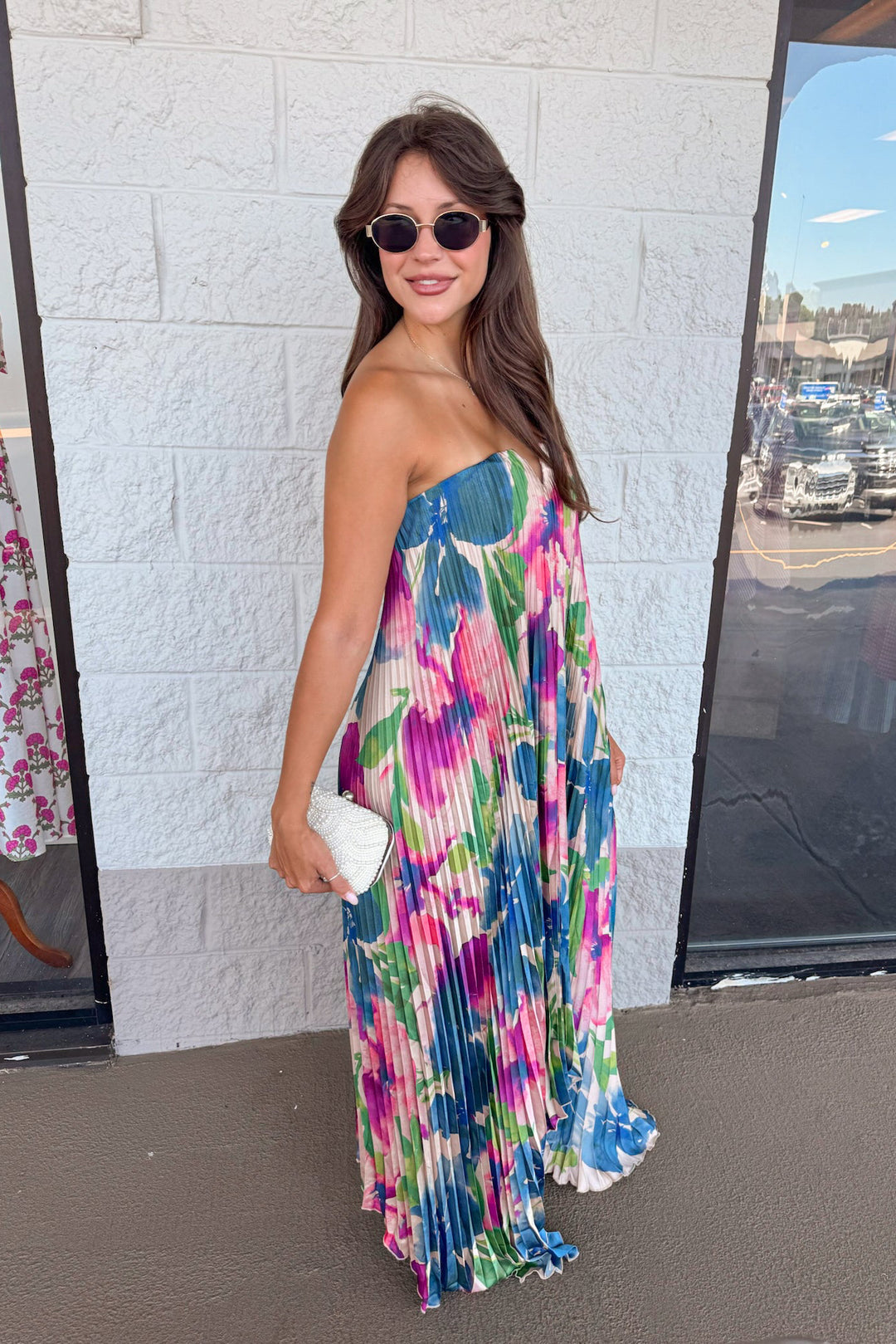 formal event wear pleated satin jewel tone floral print maxi dress side view