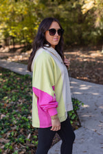 pink lime green color block pullover