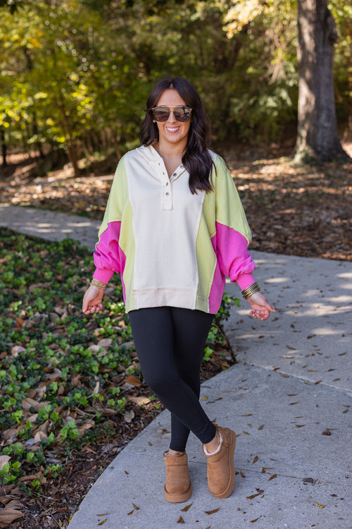 pink lime green color block pullover