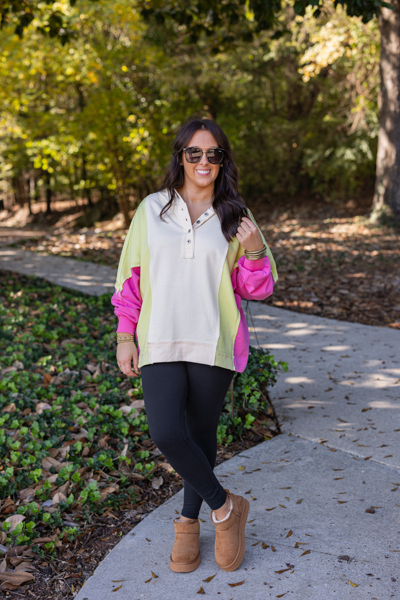 pink lime green color block pullover