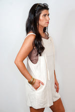 cream textured pinafore romper