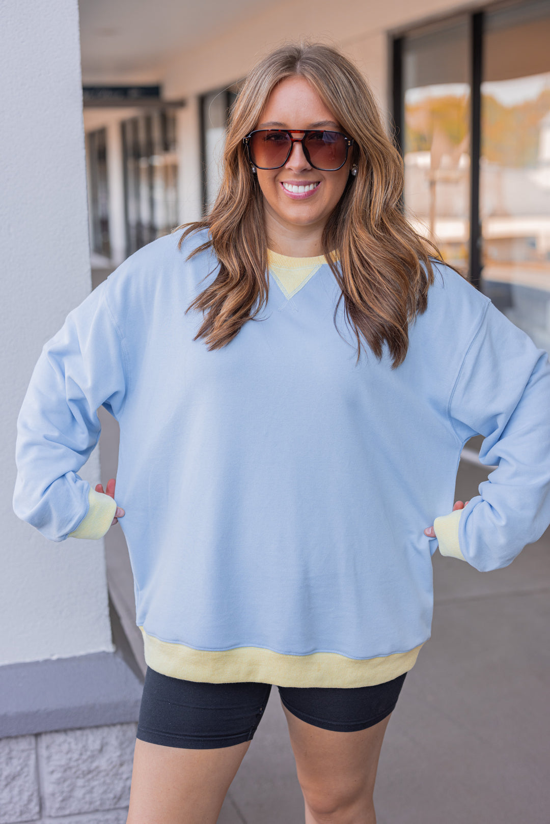 blue yellow trim pullover sweatshirt