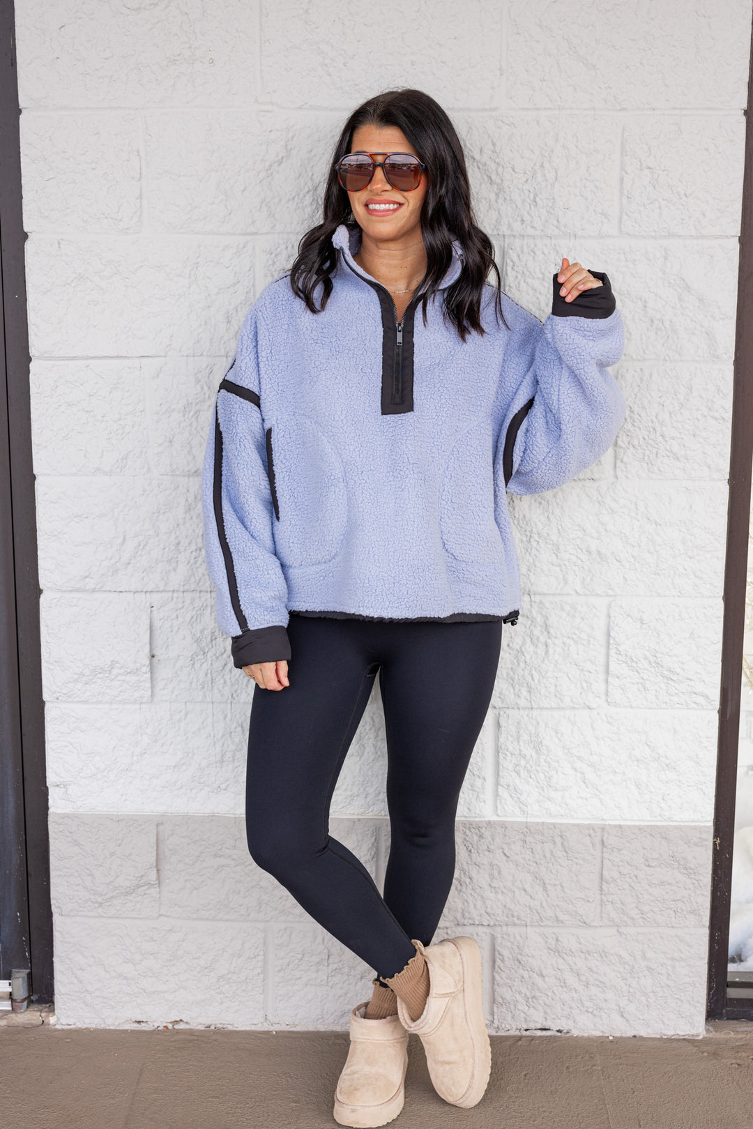 Women's bluish lavender sherpa quarter zip pullover jacket with black trim by Rae Mode showing full front view