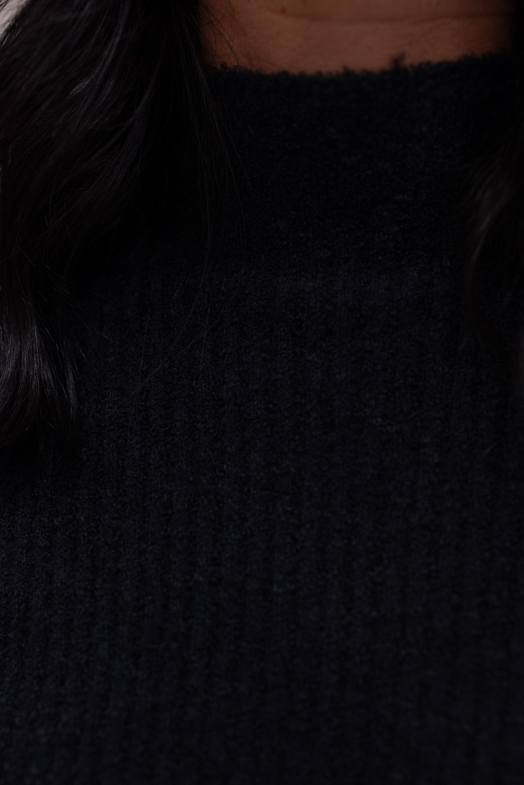Women's black mock neck sweater top with side slits by Mustard Seed showing up close look at ribbed knit detail
