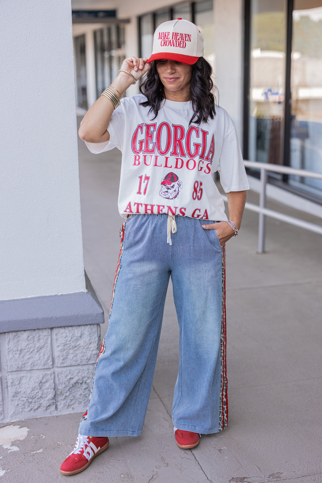 Women's blue denim wide leg pants with red ribbon and brown leopard print sides by Easel, perfect for gameday