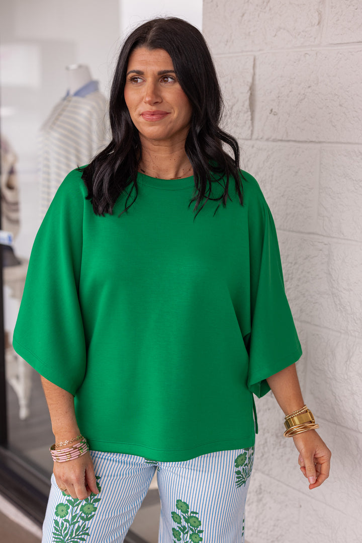 Green scuba knit short sleeve top