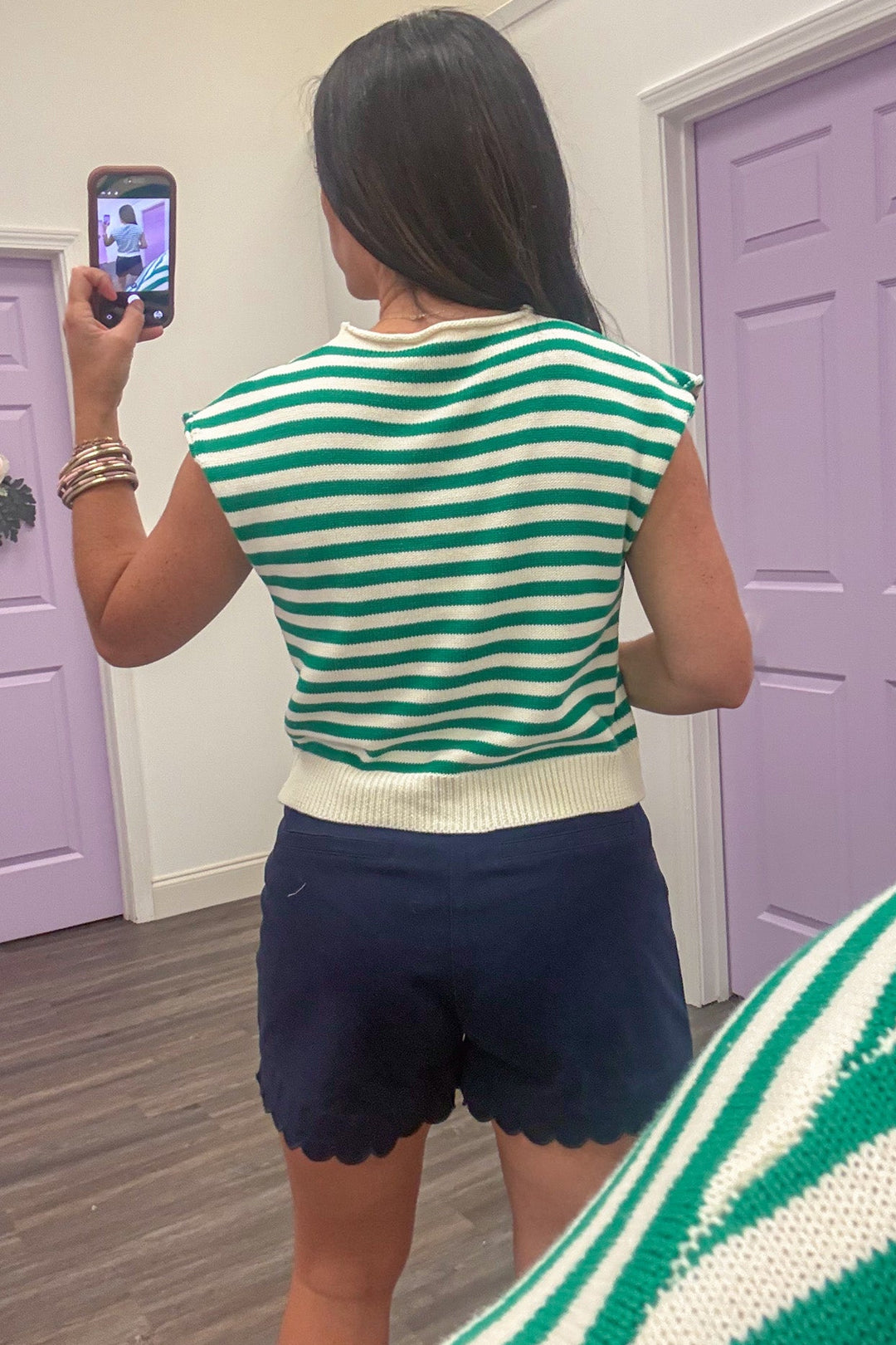 green and cream horizontal striped button front sleeveless knit top