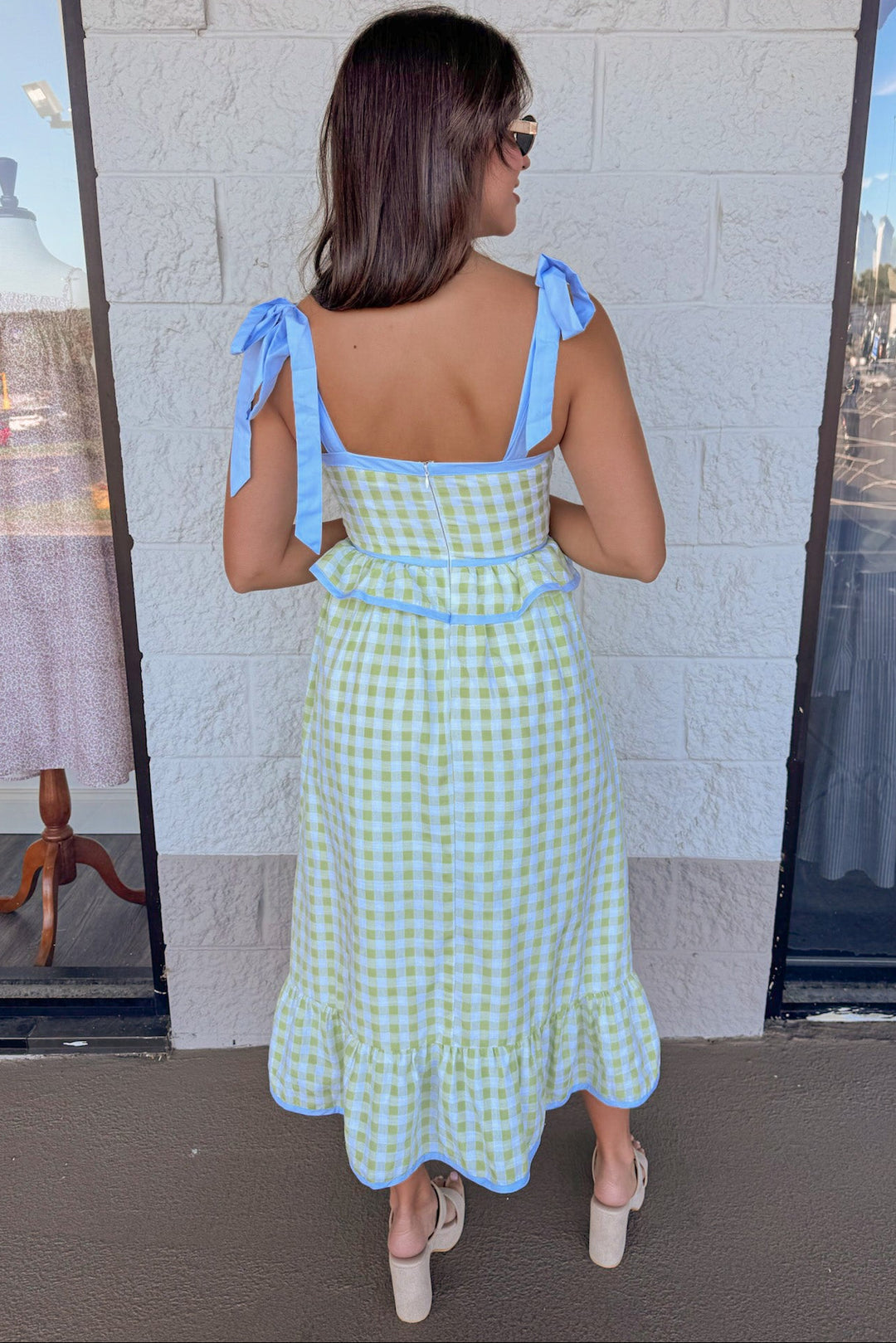 honeydew green gingham print with light blue trim details peplum style back zipper closure midi dress