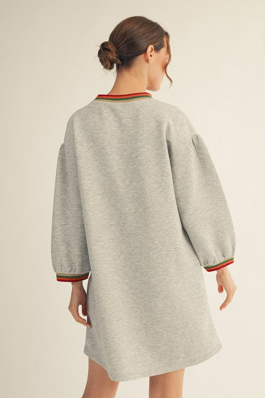 Women's heather grey scuba knit sweatshirt dress with multicolor striped trim by Jodifl showing back view