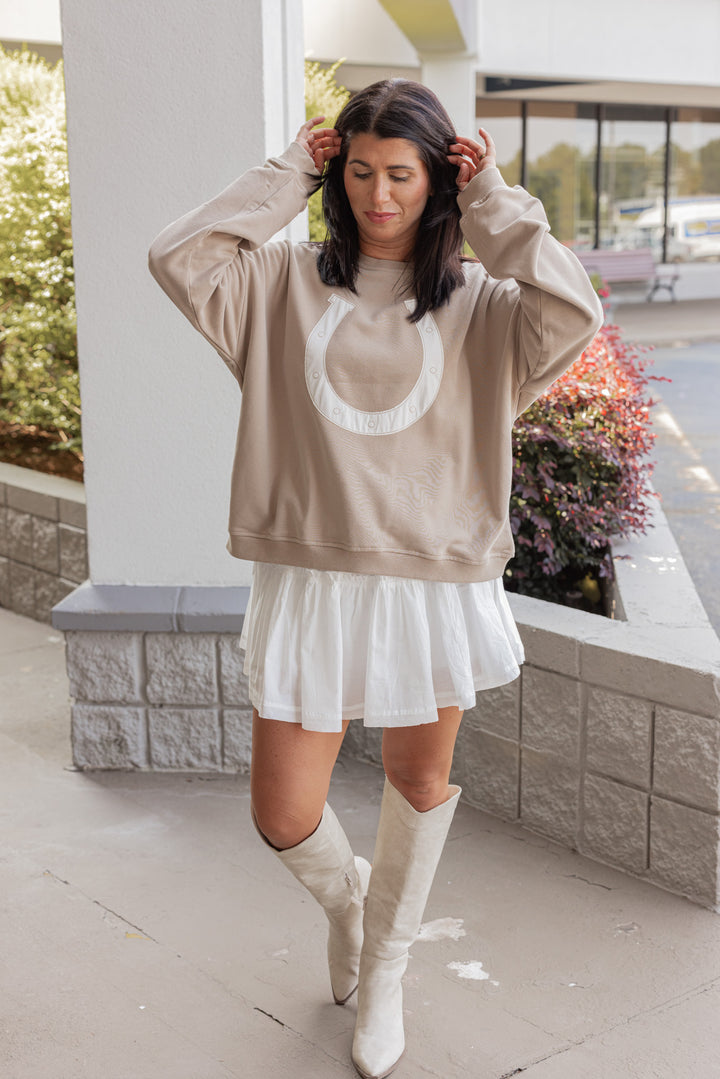 Women's trendy and perfect for fall taupe terry knit pullover sweatshirt with a white horseshoe on front by Wishlist