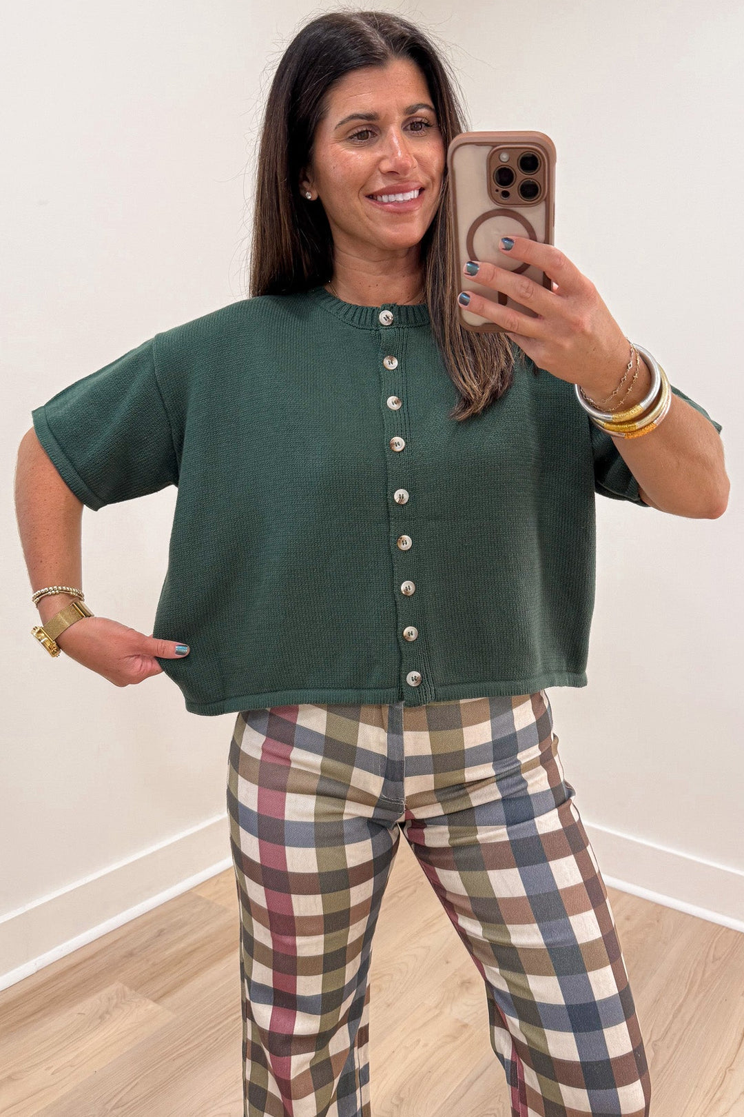 solid hunter green crew neckline button front short sleeve relaxed silhouette knit cardigan top