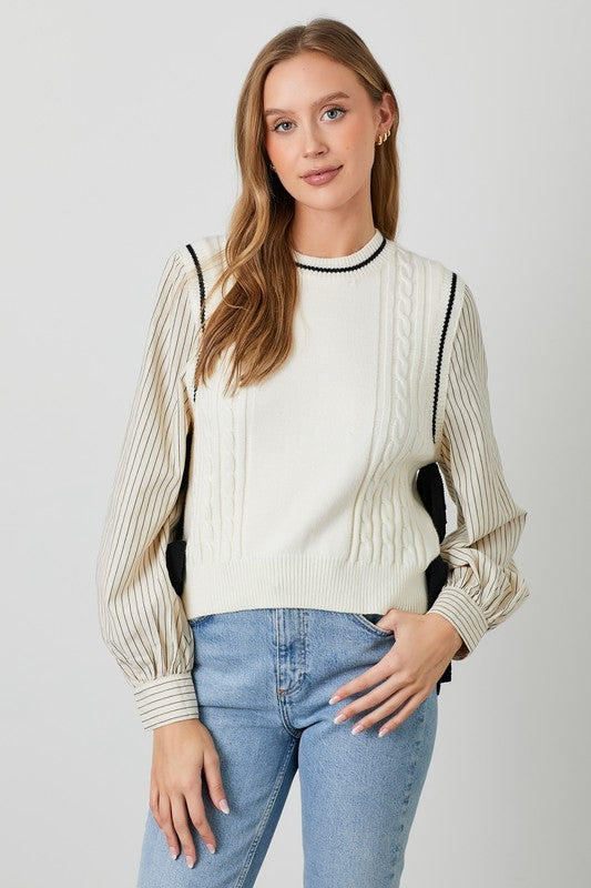 Polagram BaeVely Ivory and black sweater vest with bow tie details over faux ivory and black top