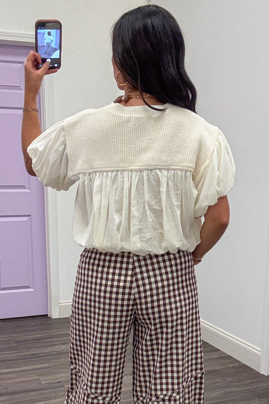 solid ivory puff sleeve bubble hem ribbed sweater and woven fabric top back view