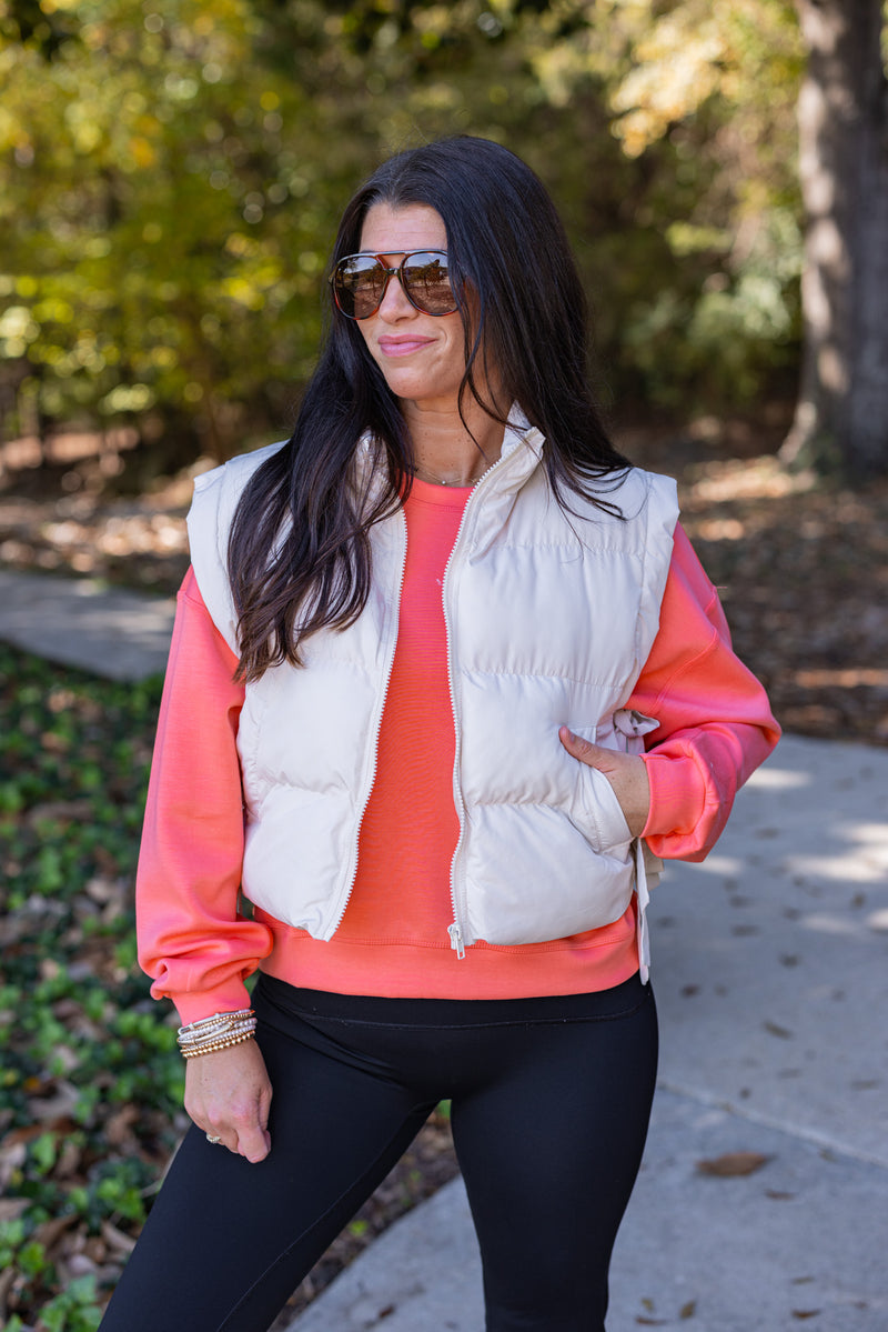 cropped ivory bow puffer vest