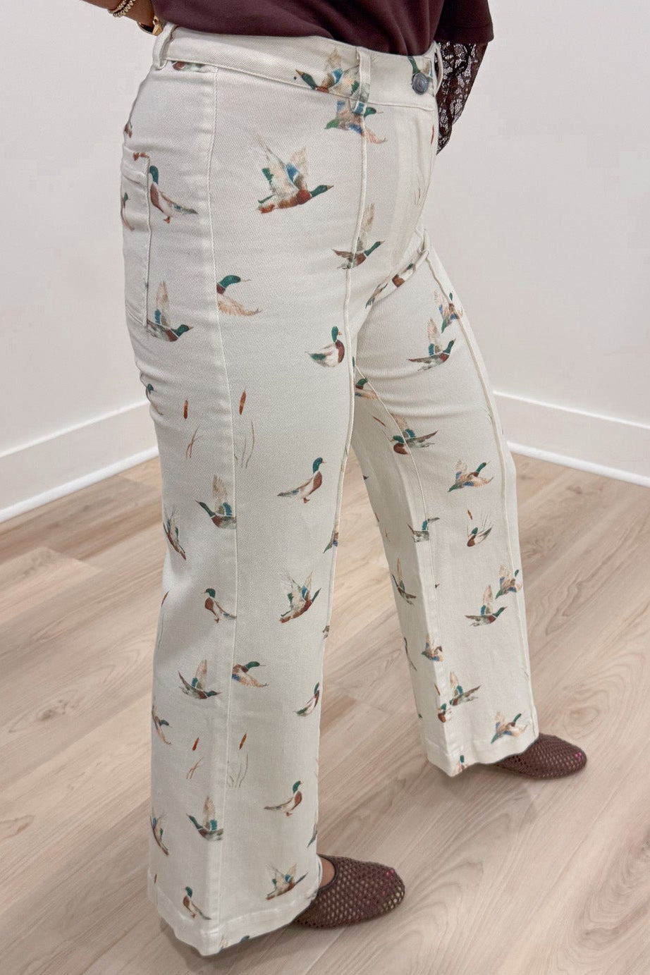 washed ivory with printed mallard ducks twill denim wide leg pants with belt loops