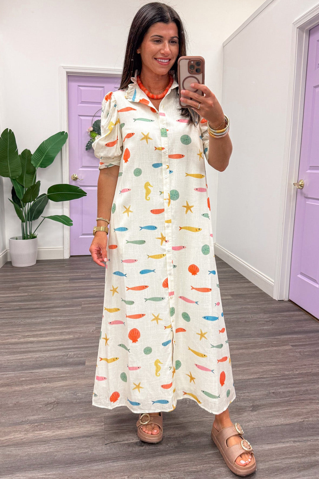 ivory with multicolored fish and seashell print button front maxi dress