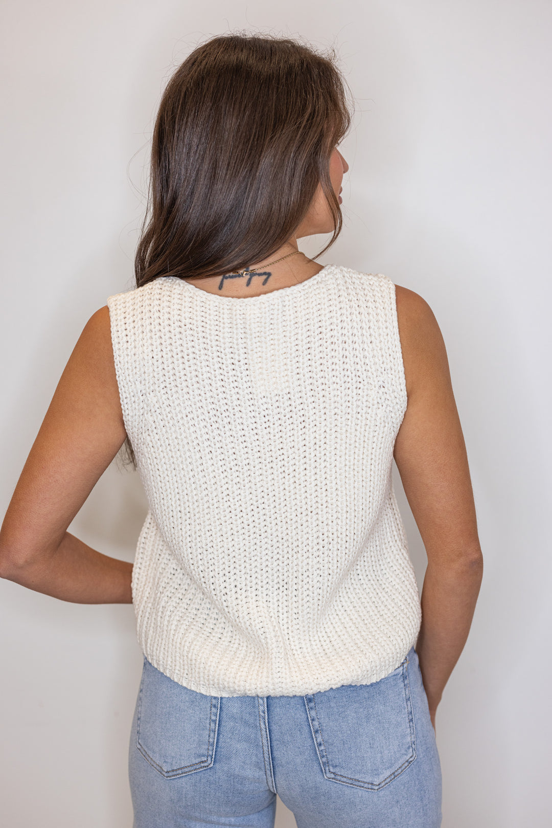 ivory sleeveless sweater cardigan top