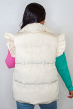 ivory puffer ruffle vest