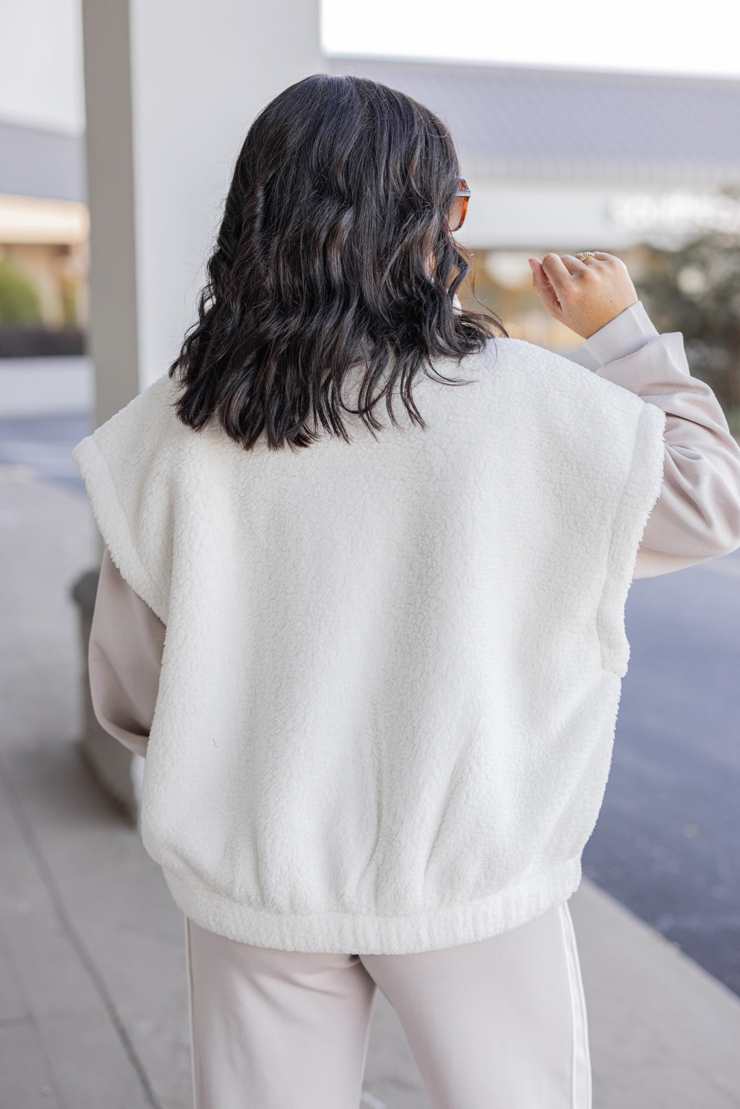 Women's ivory sherpa vest by Rae Mode showing up close back view