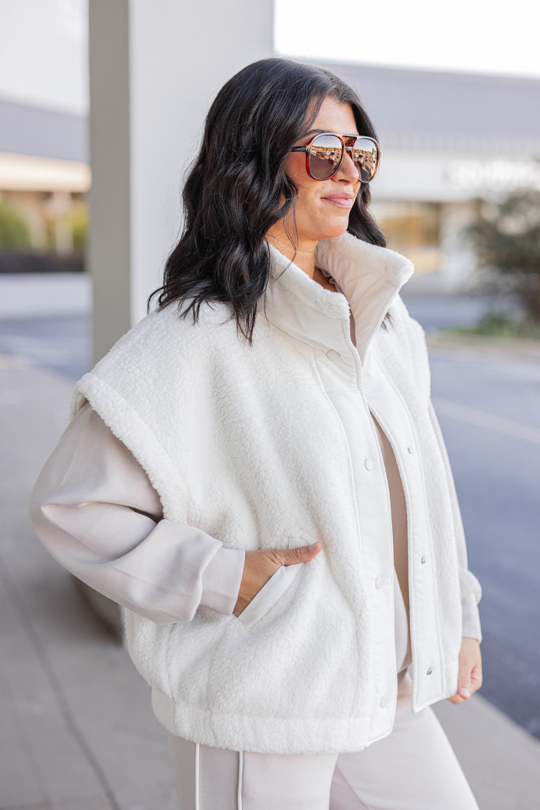 Women's ivory sherpa vest by Rae Mode showing up close side view