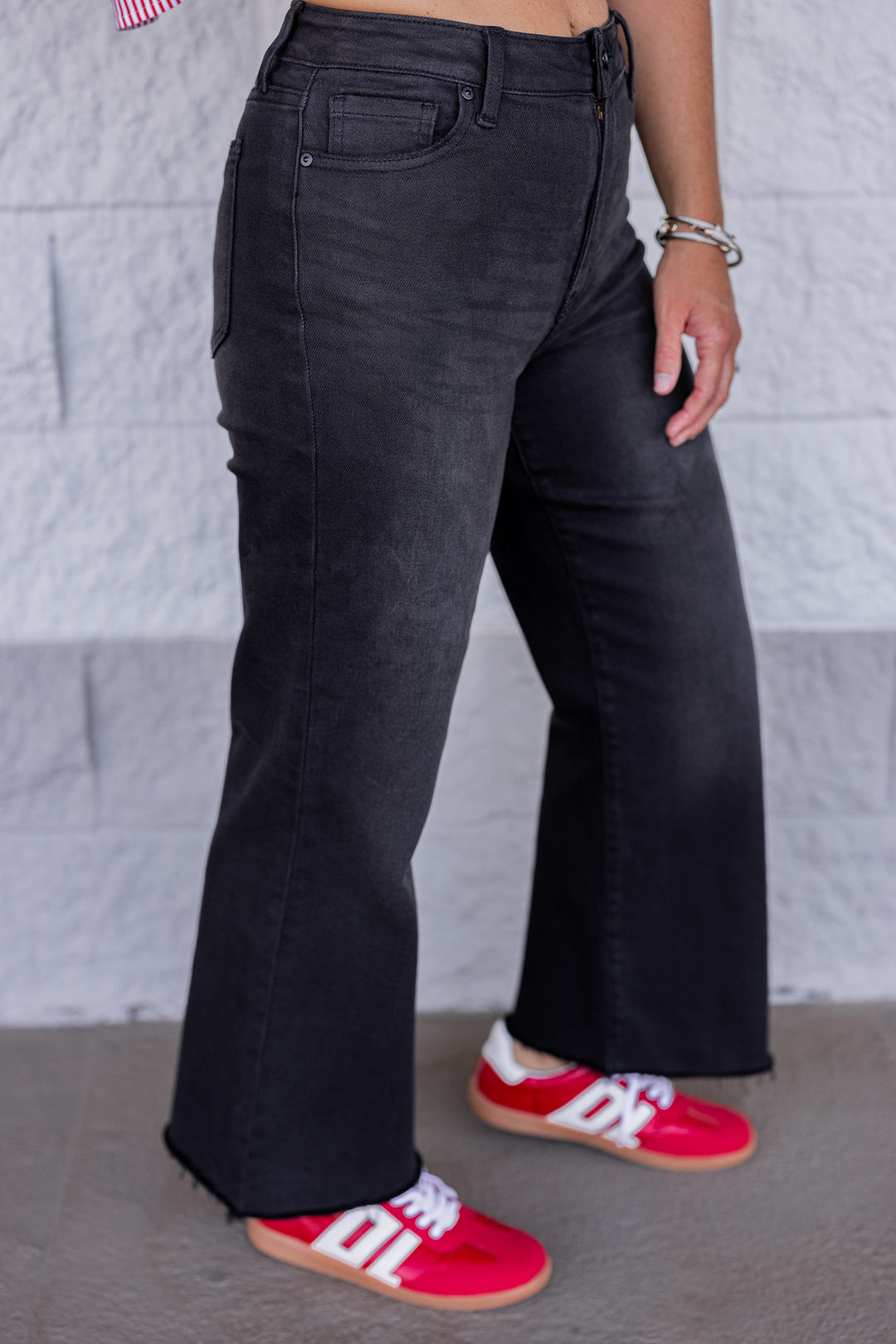 Just Black Denim slim wide leg washed black denim jeans showing slight side view