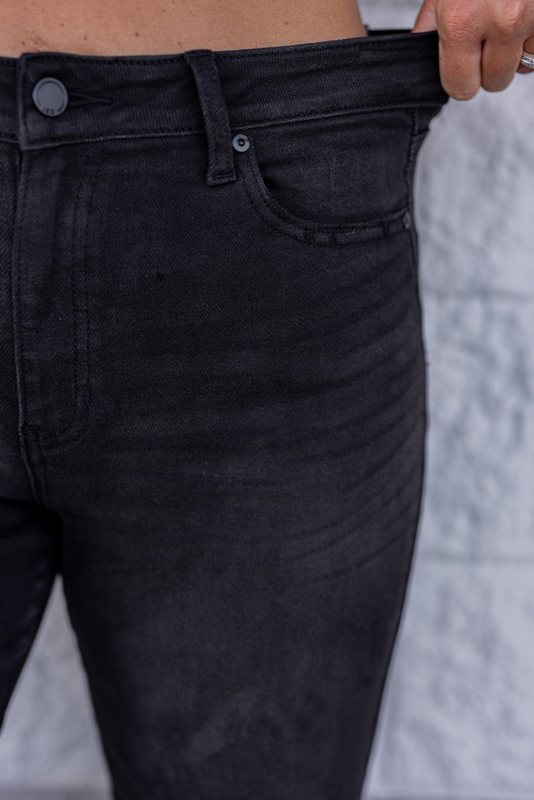 Just Black Denim slim wide leg washed black denim jeans showing waistband's stretch