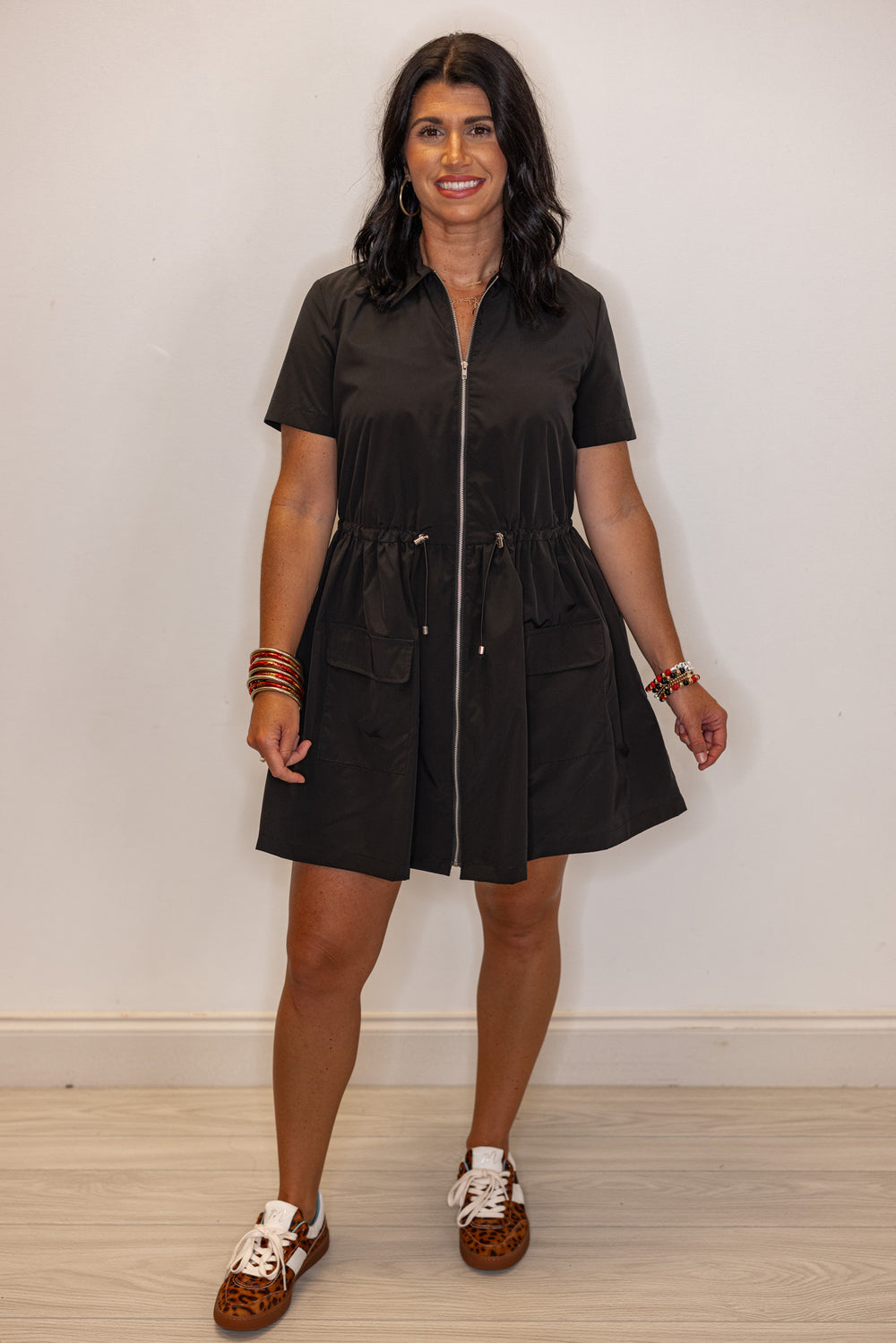 Women's black cinch waist dress by Karlie showing full front view