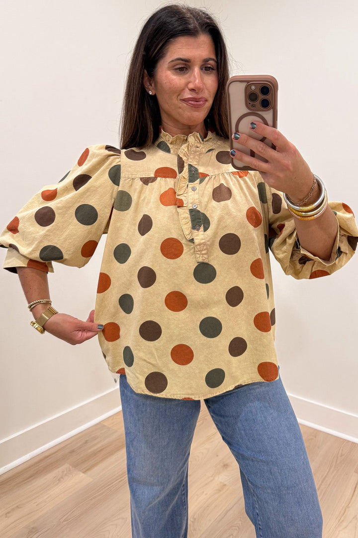 khaki with orange brown and green polka dot print button front bodice puff sleeve relaxed silhouette top