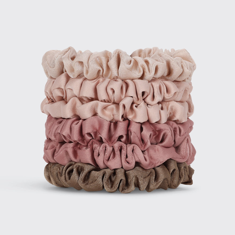 Stack of pink and brown scrunchies 