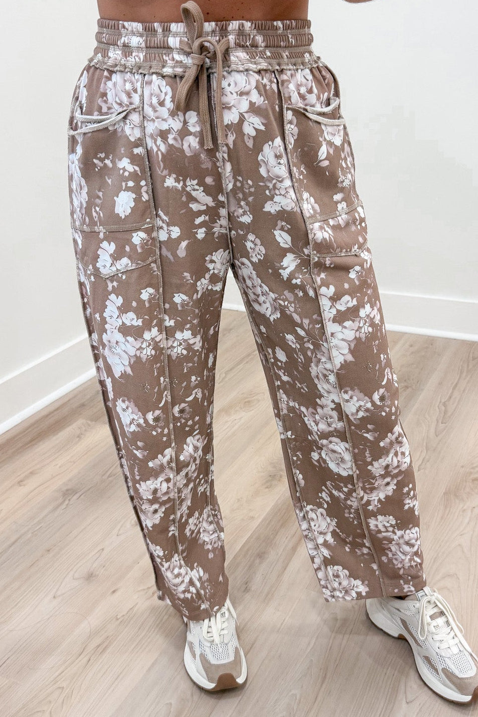 latte with cream floral print elastic waist barrel leg french terry knit pants with reverse seam details