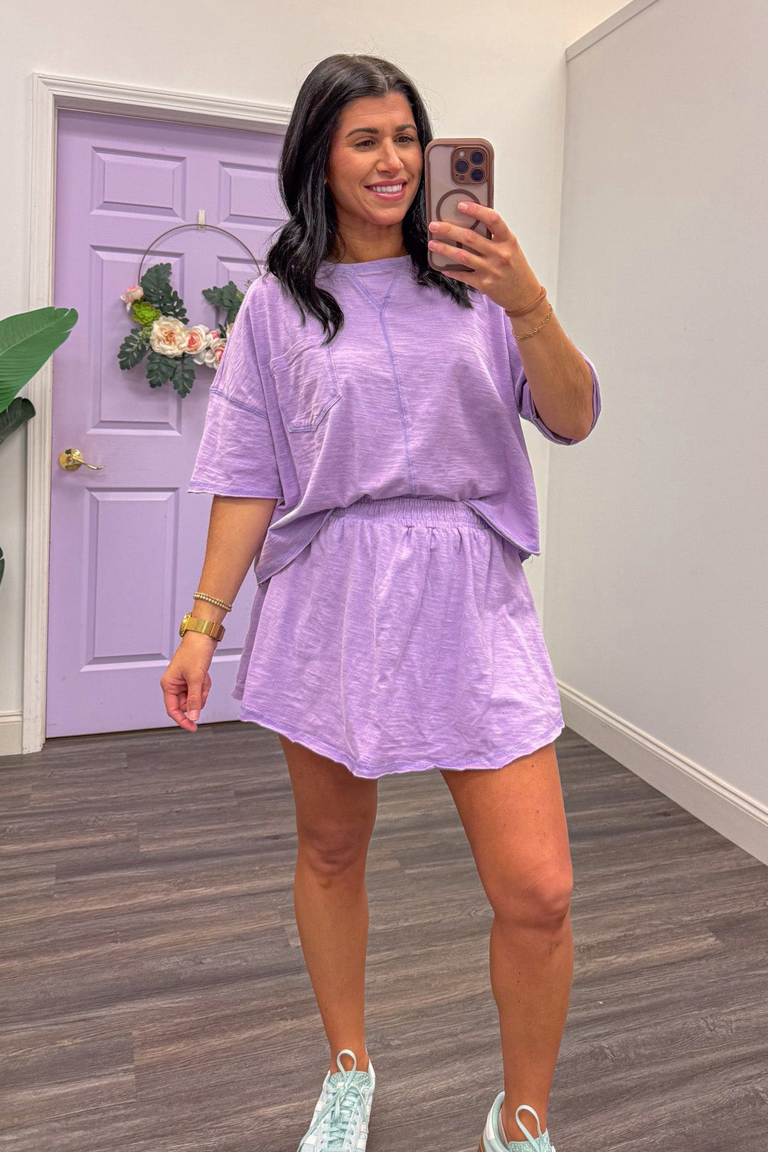 Women's lavender athleisure skort with matching top.