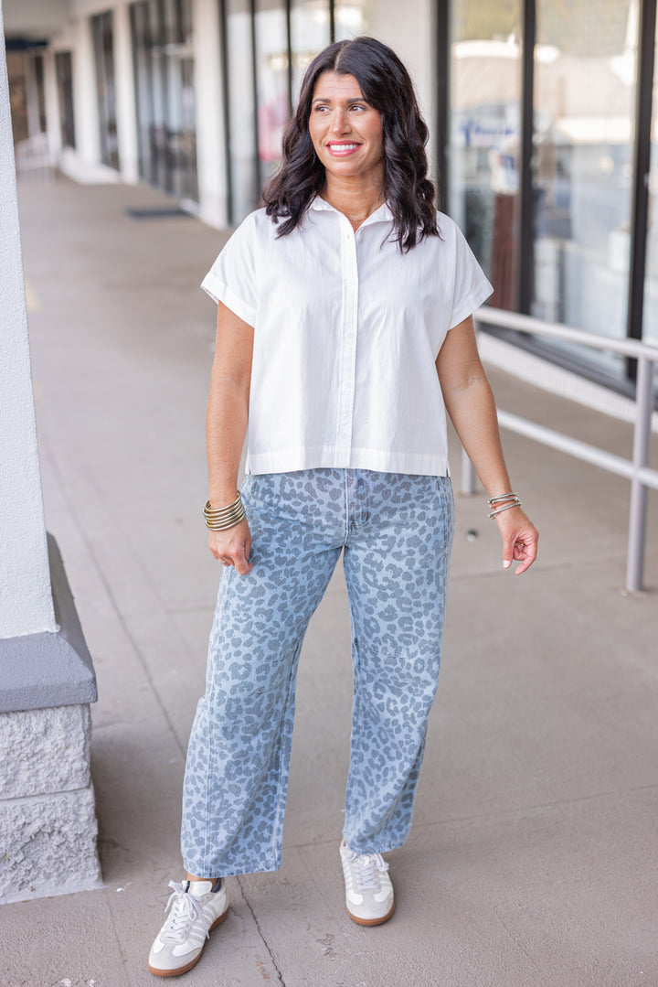 Washed blue and black leopard print barrel denim pants by Entro, perfect for fall weather 