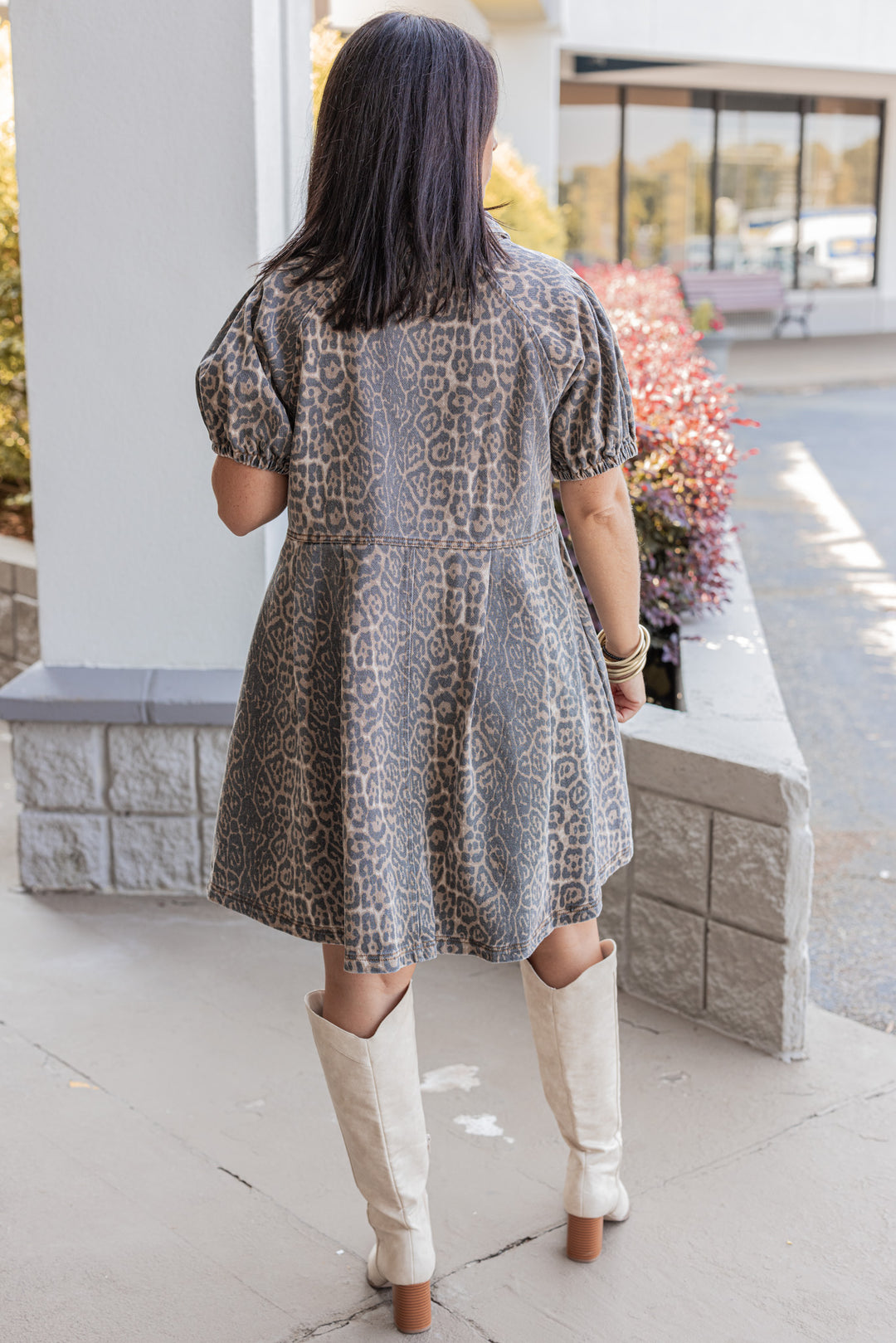 Brown and black washed denim animal print snap front dress with collar by Entro showing back view
