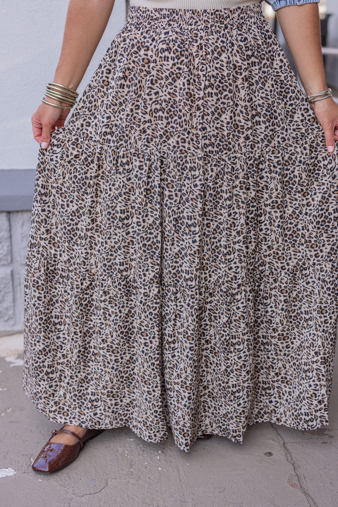 Women's taupe, black and brown leopard print tiered maxi skirt by Jodifl showing tiered details