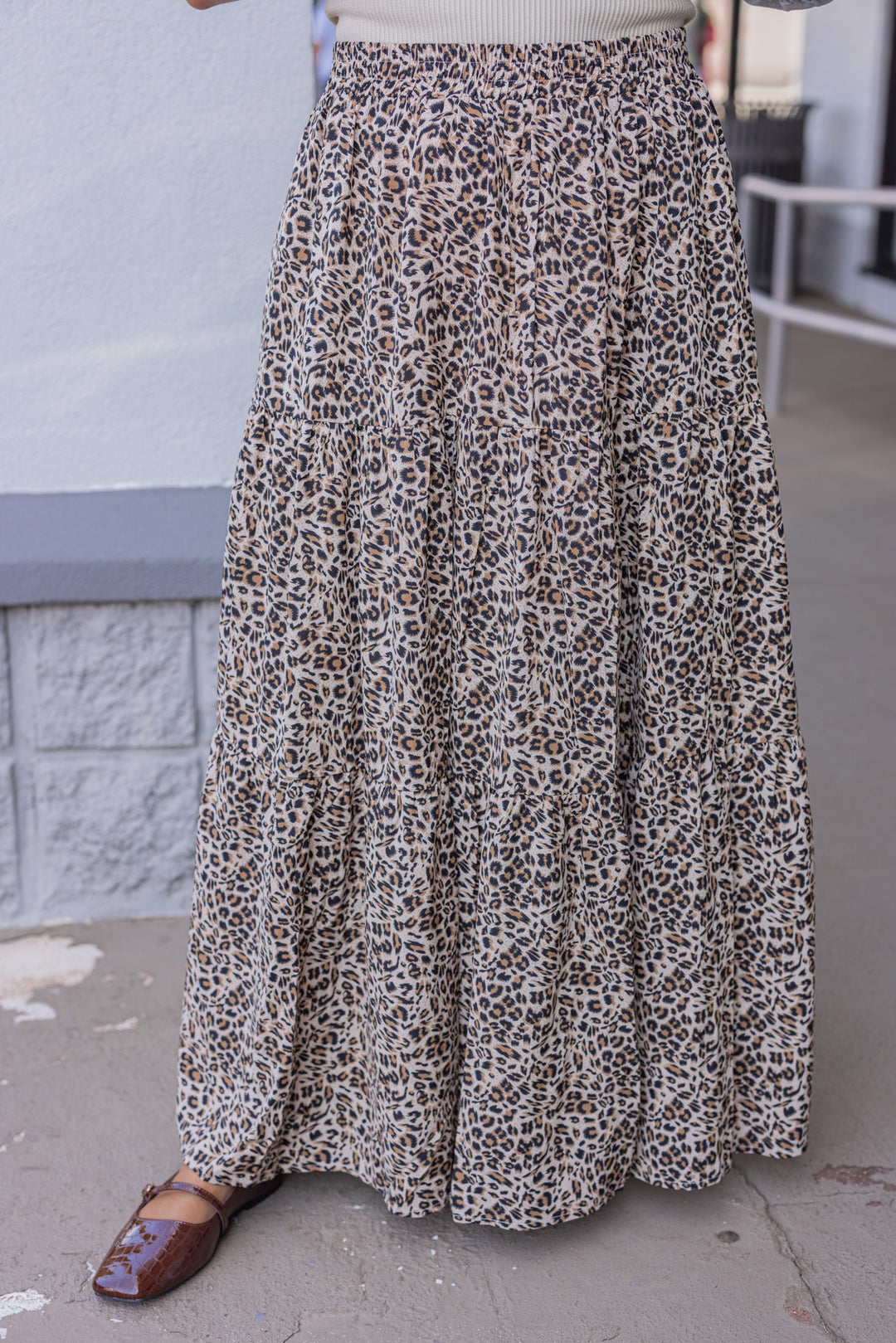 Women's taupe, black and brown leopard print tiered maxi skirt by Jodifl showing up close front view