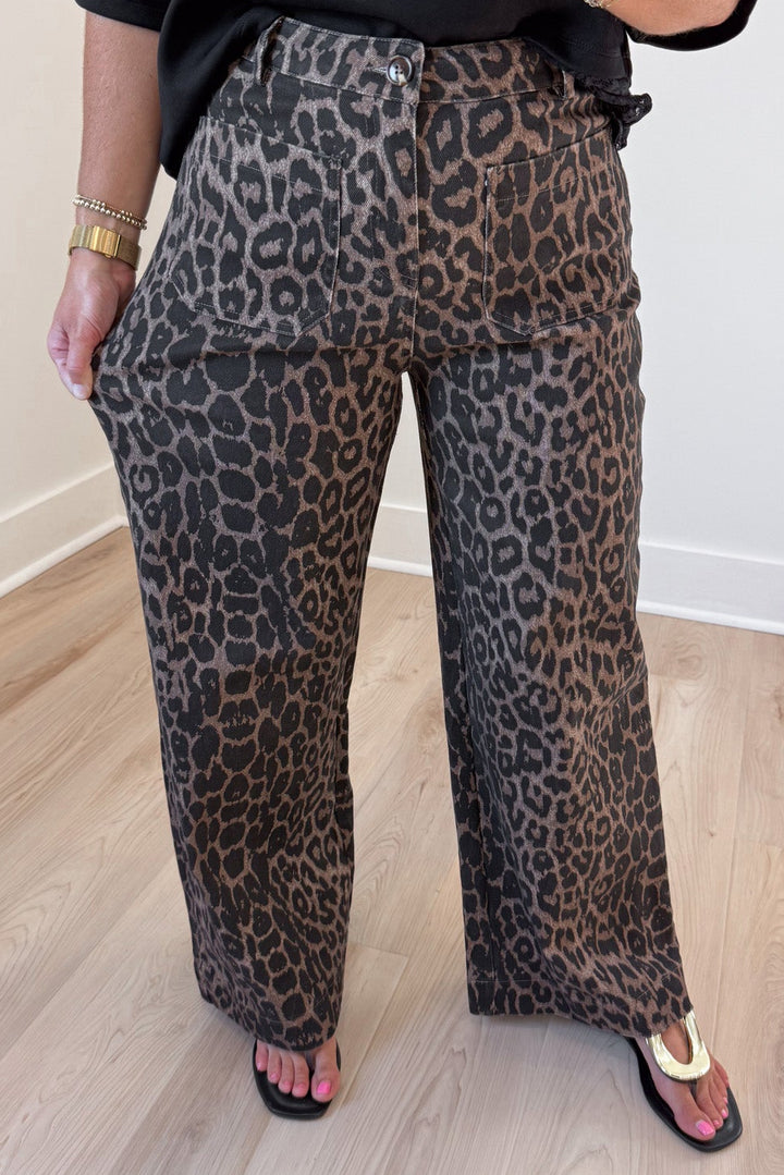 brown and black leopard print button zipper fly wide stretch leg twill denim pants