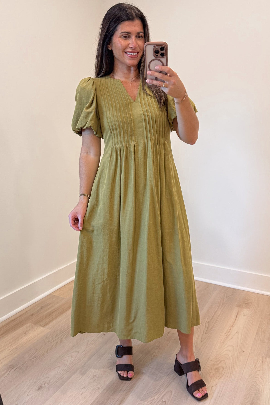 solid light olive green puff sleeve v neckline pleated bodice midi dress